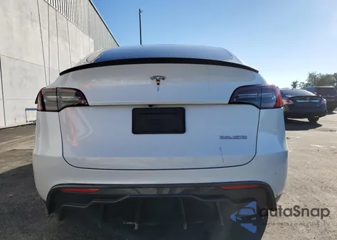 2023 Tesla Model Y из США, поврежденный, VIN 7SAYGDEFXPF714798